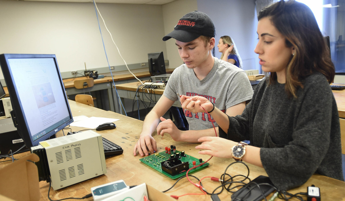 students in physics lab