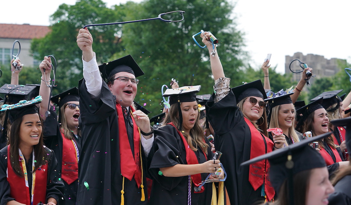 Students celebrating at their commencement