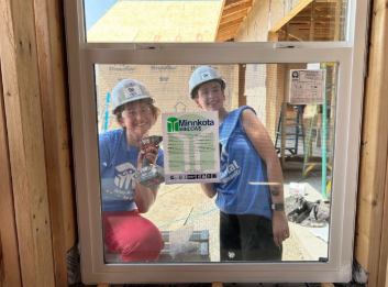 a&s students habitat for humanity behind window