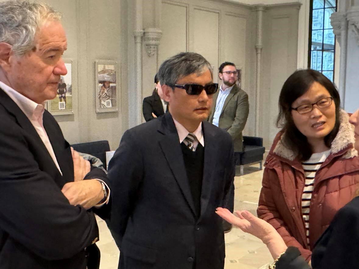 Dr. Saunders, Guangcheng, and Weijing (Guangcheng's wife) attending the event.